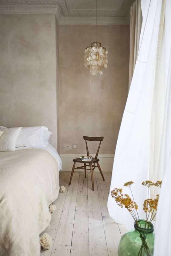 Tranquil bedroom with white curtains